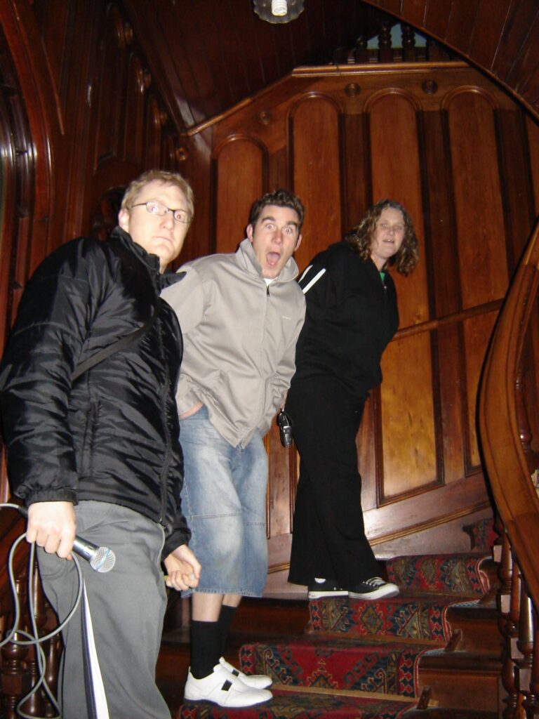 Ready to head up the ornate stairwell in Larnach Castle